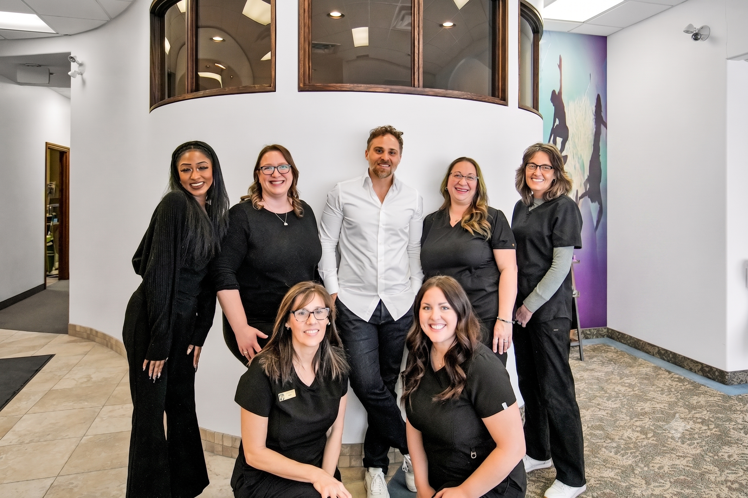 The Root Cause Dental Group team together at their London, Ontario dental clinic